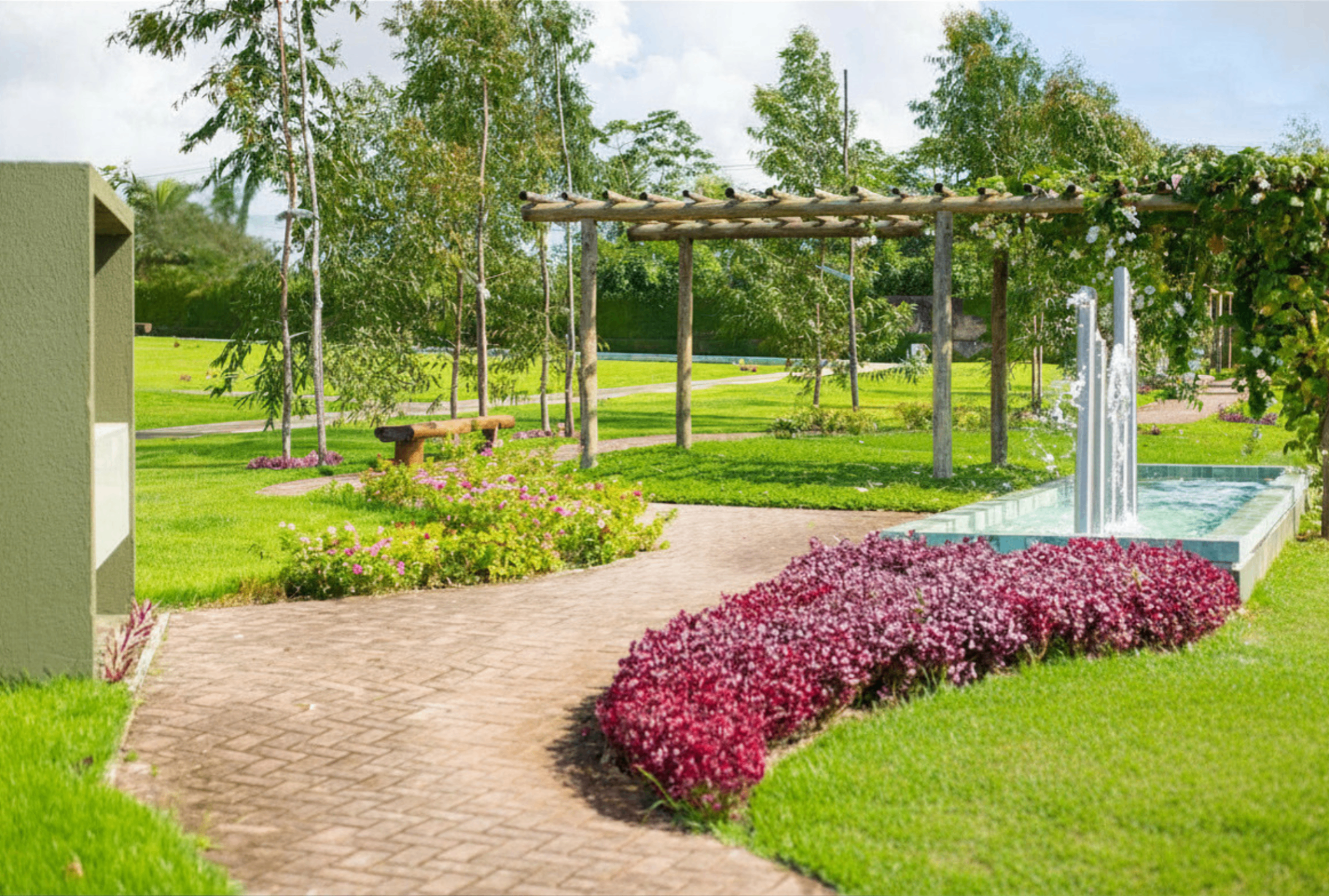 Pergolado, fonte e jardins floridos do Jardim dos Eucaliptos